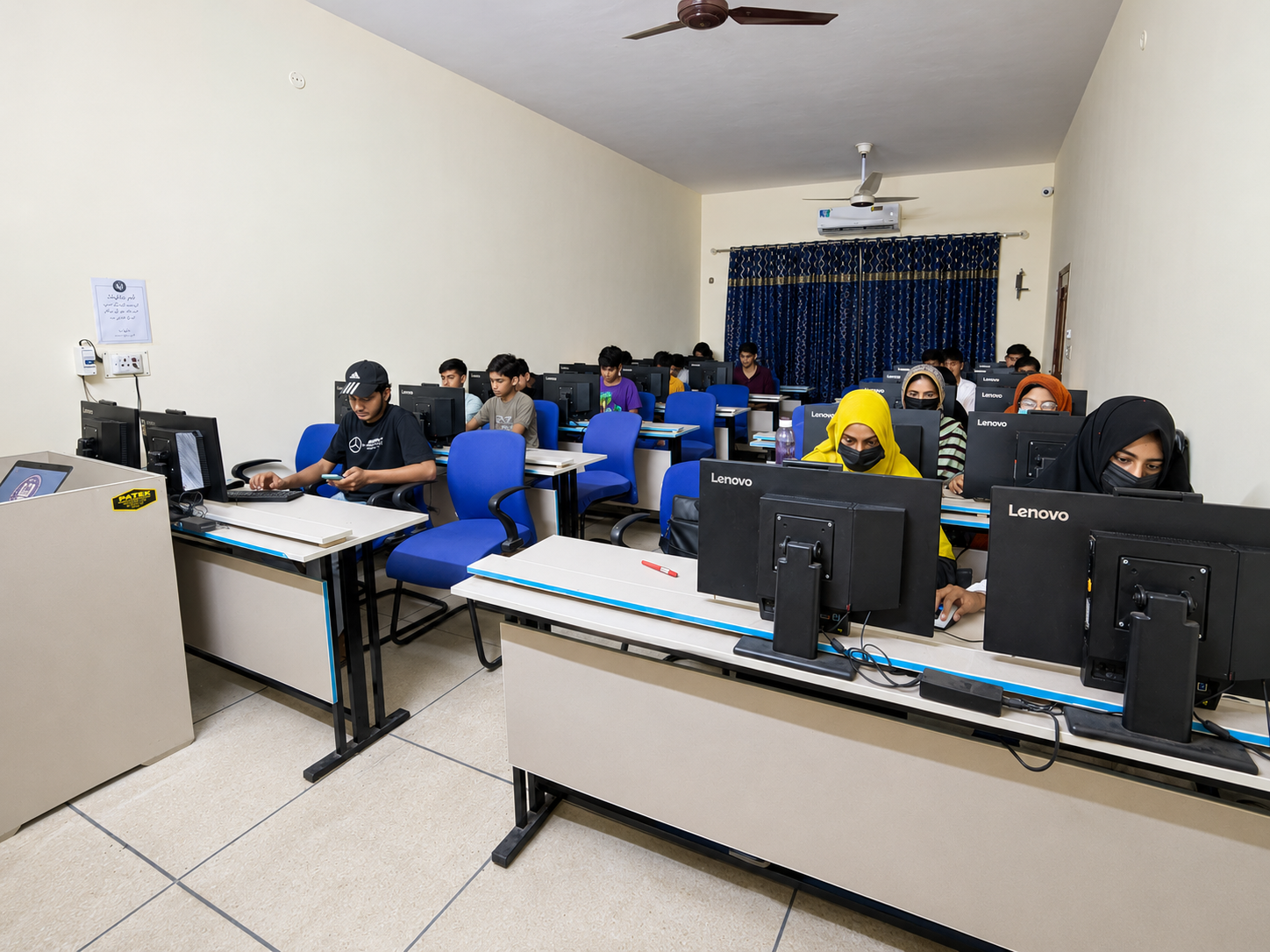 Computer training classroom at CSDC showing students learning practical computer skills